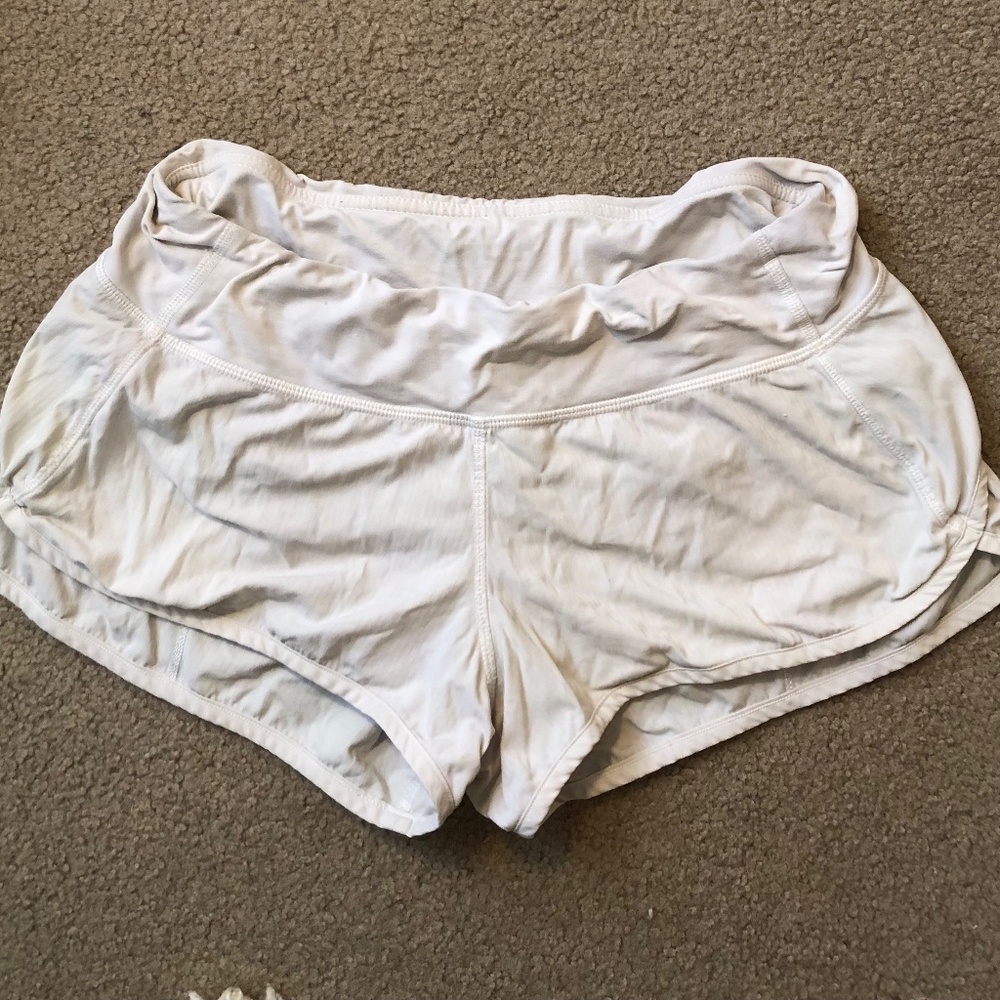 Womens White Lululemon Speed Up shorts, size 6